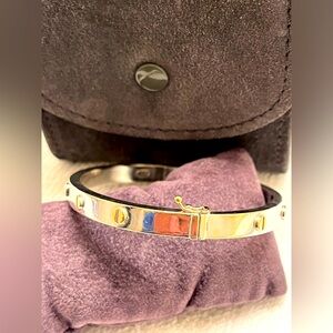 Banglle Love Style in solid white gold bangle & yellow gold screws.